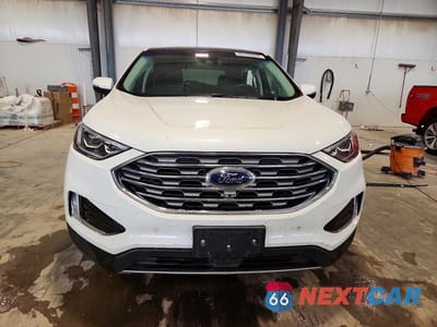 Piąte zdjęcie samochodu w środku: 2020 FORD EDGE TITANIUM VIN:2FMPK4K93LBB24774 - miniatura