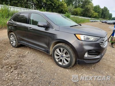Czwarte zdjęcie samochodu z boku: 2019 FORD EDGE TITANIUM VIN:2FMPK4K96KBC61349 - miniatura