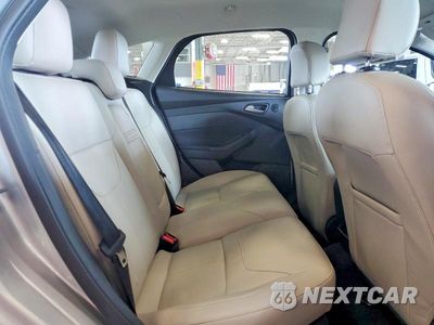Zdjęcie 10 z 12 samochodu: 2016 FORD FOCUS TITANIUM VIN:1FADP3N20GL307465 - miniatura