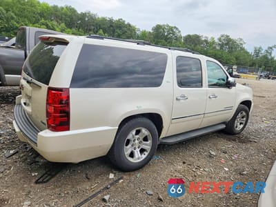 Trzecie zdjęcie samochodu z tyłu: 2011 CHEVROLET SUBURBAN K1500 LTZ VIN:1GNSKKE34BR366132 - miniatura