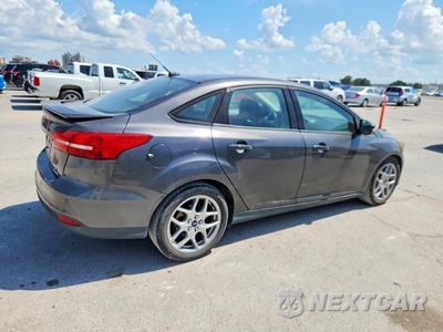 Trzecie zdjęcie samochodu z tyłu: 2015 FORD FOCUS SE VIN:1FADP3F27FL230400 - miniatura