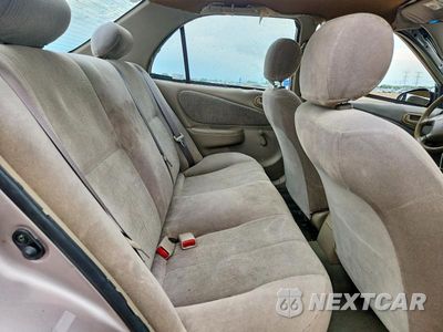 Zdjęcie 10 z 12 samochodu: 2002 TOYOTA COROLLA CE VIN:1NXBR12E22Z573650 - miniatura