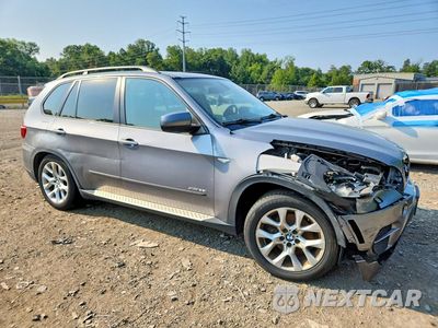 Czwarte zdjęcie samochodu z boku: 2012 BMW X5 XDRIVE35I VIN:5UXZV4C50CL764049 - miniatura