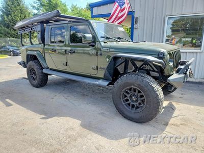 Czwarte zdjęcie samochodu z boku: 2022 JEEP GLADIATOR SPORT VIN:1C6HJTAG1NL101266 - miniatura