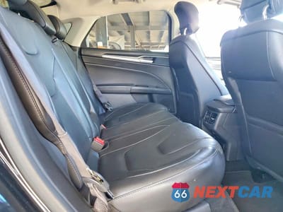 Zdjęcie 10 z 12 samochodu: 2014 FORD FUSION TITANIUM PHEV VIN:3FA6P0SU5ER195287 - miniatura
