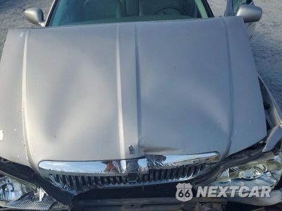 Zdjęcie 11 z 12 samochodu: 2003 LINCOLN TOWN CAR SIGNATURE VIN:1LNHM82W33Y670506 - miniatura