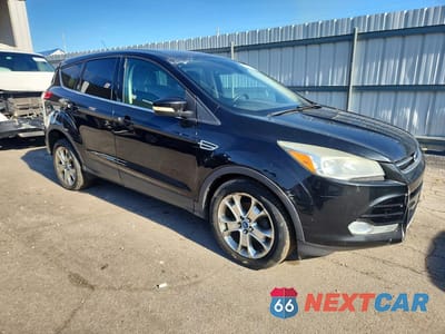 Czwarte zdjęcie samochodu z boku: 2013 FORD ESCAPE SEL VIN:1FMCU0HX0DUB57220 - miniatura