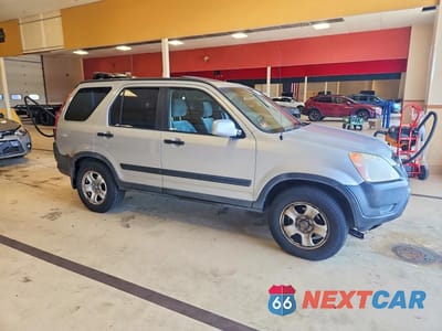 Czwarte zdjęcie samochodu z boku: 2004 HONDA CR-V EX VIN:SHSRD78864U220712 - miniatura