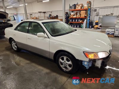 Czwarte zdjęcie samochodu z boku: 1997 LEXUS ES 300 VIN:JT8BF22G3V0078226 - miniatura