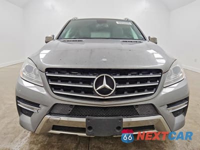Piąte zdjęcie samochodu w środku: 2012 MERCEDES-BENZ ML 550 4MATIC VIN:4JGDA7DB3CA056947 - miniatura