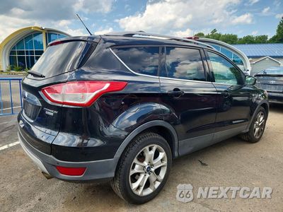 Trzecie zdjęcie samochodu z tyłu: 2015 FORD ESCAPE TITANIUM VIN:1FMCU9J99FUA55885 - miniatura