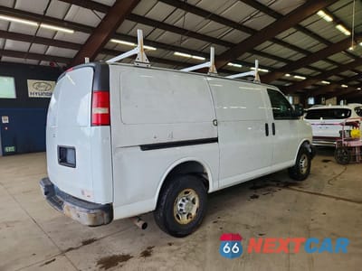 Trzecie zdjęcie samochodu z tyłu: 2014 CHEVROLET EXPRESS G2500 VIN:1GCWGFCAXE1145884 - miniatura
