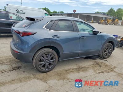 Trzecie zdjęcie samochodu z tyłu: 2023 MAZDA CX-30 PREFERRED VIN:3MVDMBCMXPM566298 - miniatura