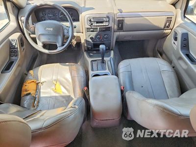Zdjęcie 8 z 13 samochodu: 2004 JEEP GRAND CHEROKEE LAREDO VIN:1J4GX48S04C386019 - miniatura