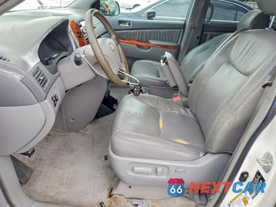 Zdjęcie 7 z 13 samochodu: 2010 TOYOTA SIENNA XLE VIN:5TDYK4CC5AS303560 - miniatura