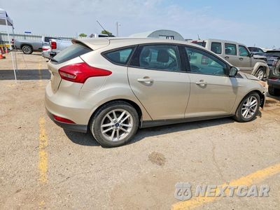 Trzecie zdjęcie samochodu z tyłu: 2017 FORD FOCUS SE VIN:1FADP3K24HL217113 - miniatura