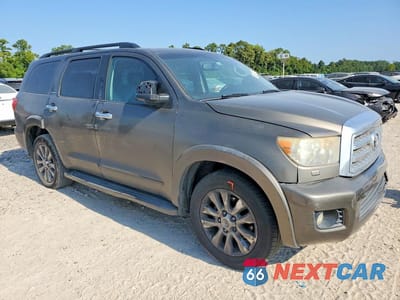 Czwarte zdjęcie samochodu z boku: 2011 TOYOTA SEQUOIA LIMITED VIN:5TDJW5G12BS047724 - miniatura