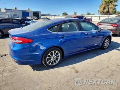 Trzecie zdjęcie samochodu z tyłu: 2017 FORD FUSION SE HYBRID VIN:3FA6P0LU4HR301070 - miniatura