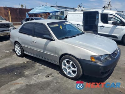 Czwarte zdjęcie samochodu z boku: 2002 TOYOTA COROLLA S VIN:1NXBR12E12Z655160 - miniatura
