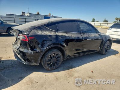 Trzecie zdjęcie samochodu z tyłu: 2023 TESLA MODEL Y VIN:7SAYGDEE1PA188923 - miniatura
