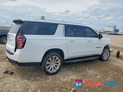 Trzecie zdjęcie samochodu z tyłu: 2023 CHEVROLET SUBURBAN K1500 PREMIER VIN:1GNSKFKD7PR230489 - miniatura