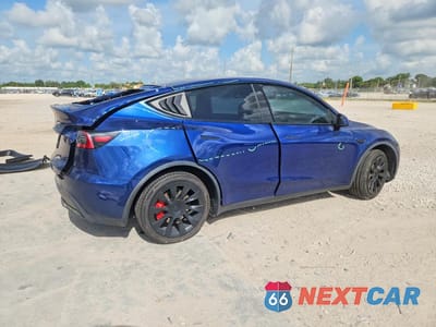 Trzecie zdjęcie samochodu z tyłu: 2020 TESLA MODEL Y VIN:5YJYGDEF1LF000470 - miniatura