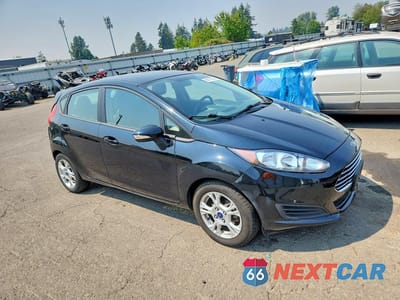 Czwarte zdjęcie samochodu z boku: 2016 FORD FIESTA SE VIN:3FADP4EJ9GM122391 - miniatura