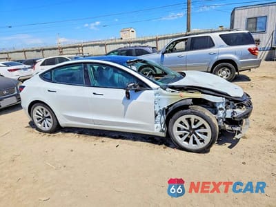 Czwarte zdjęcie samochodu z boku: 2023 TESLA MODEL 3 VIN:5YJ3E1EA7PF446843 - miniatura