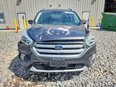 Piąte zdjęcie samochodu w środku: 2017 FORD ESCAPE TITANIUM VIN:1FMCU9J92HUB97711 - miniatura