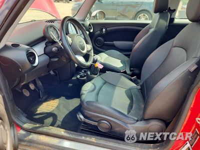 Zdjęcie 7 z 12 samochodu: 2010 MINI COOPER VIN:WMWMF3C51ATU78840 - miniatura