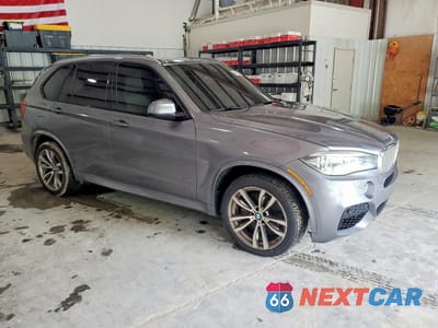 Czwarte zdjęcie samochodu z boku: 2015 BMW X5 XDRIVE50I VIN:5UXKR6C57F0J77032 - miniatura