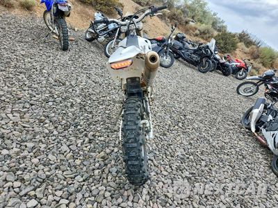 Czwarte zdjęcie samochodu z boku: 2010 BMW G450 X VIN:WB1014500AZV04068 - miniatura