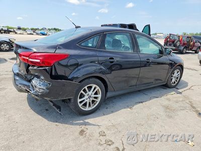 Trzecie zdjęcie samochodu z tyłu: 2016 FORD FOCUS SE VIN:1FADP3F2XGL300926 - miniatura
