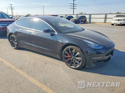 Czwarte zdjęcie samochodu z boku: 2018 TESLA MODEL 3 VIN:5YJ3E1EB0JF069675 - miniatura