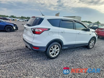 Trzecie zdjęcie samochodu z tyłu: 2017 FORD ESCAPE SE VIN:1FMCU9GD3HUB52515 - miniatura