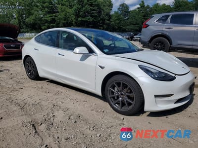 Czwarte zdjęcie samochodu z boku: 2020 TESLA MODEL 3 VIN:5YJ3E1EAXLF783663 - miniatura