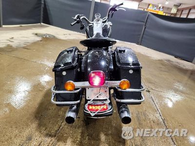 Czwarte zdjęcie samochodu z boku: 2012 HARLEY-DAVIDSON FLHP POLICE ROAD KING VIN:1HD1FHM18CB625435 - miniatura