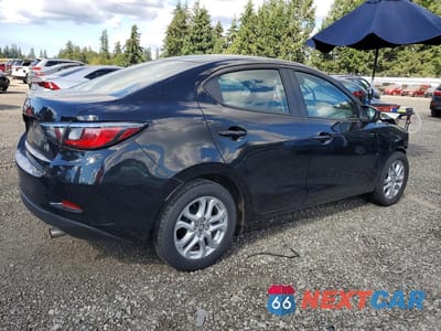 Trzecie zdjęcie samochodu z tyłu: 2018 TOYOTA YARIS IA BASE VIN:3MYDLBYV8JY317800 - miniatura