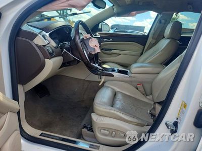 Zdjęcie 7 z 14 samochodu: 2014 CADILLAC SRX LUXURY COLLECTION VIN:3GYFNBE34ES567056 - miniatura