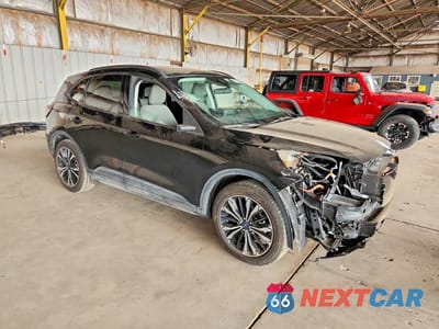 Czwarte zdjęcie samochodu z boku: 2021 FORD ESCAPE SE VIN:1FMCU0BZ8MUB31698 - miniatura