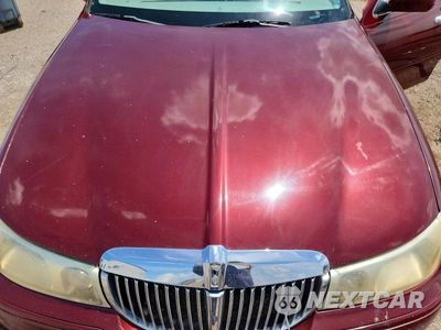 Zdjęcie 11 z 12 samochodu: 2001 LINCOLN TOWN CAR SIGNATURE VIN:1LNHM82W01Y629795 - miniatura