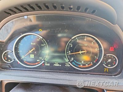 Zdjęcie 9 z 12 samochodu: 2014 BMW 750 LXI VIN:WBAYF8C55ED653279 - miniatura