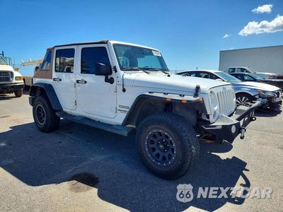 Czwarte zdjęcie samochodu z boku: 2014 JEEP WRANGLER UNLIMITED SPORT VIN:1C4BJWDG6EL145906 - miniatura