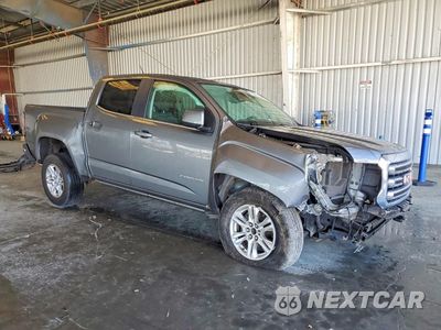 Czwarte zdjęcie samochodu z boku: 2019 GMC CANYON SLE VIN:1GTG5CEN0K1101204 - miniatura