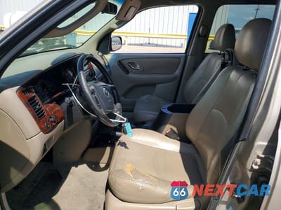 Zdjęcie 7 z 12 samochodu: 2002 MAZDA TRIBUTE LX VIN:4F2YU08142KM22591 - miniatura