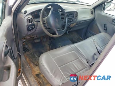 Zdjęcie 8 z 13 samochodu: 2001 FORD F150 VIN:2FTRX17L11CA29932 - miniatura