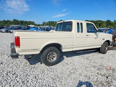 Trzecie zdjęcie samochodu z tyłu: 1990 FORD F150 VIN:1FTEX15H1LKA80066 - miniatura