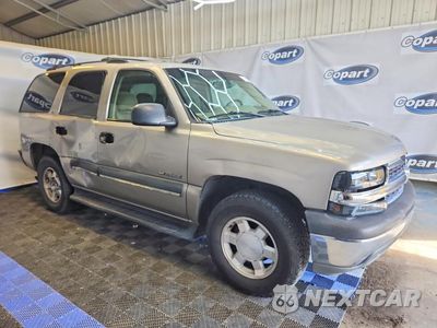 Czwarte zdjęcie samochodu z boku: 2002 CHEVROLET TAHOE C1500 VIN:1GNEC13Z52R326993 - miniatura