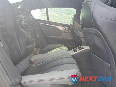 Zdjęcie 10 z 13 samochodu: 2022 BMW M850XI VIN:WBAGV8C09NCJ45647 - miniatura