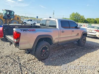 Trzecie zdjęcie samochodu z tyłu: 2019 TOYOTA TACOMA TRD OFF-ROAD VIN:3TMDZ5BN0KM077027 - miniatura